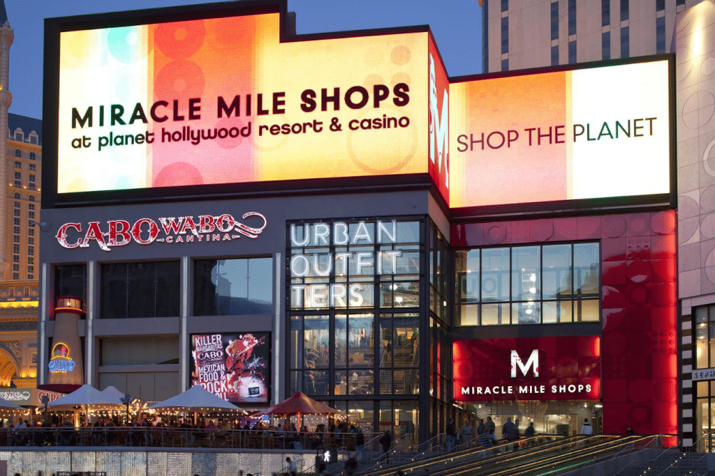 Exterior of Miracle Mile Shops. Cabo Wabo and Urban Outfitters are shown. 