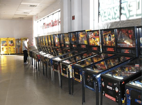 Line of pinball machines against wall at the Pinball Hall of Fame