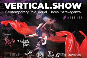 Vertical.Show Las Vegas promotional flyer. Two aerialists hanging upside down on a pole in a performance at Notoriety.